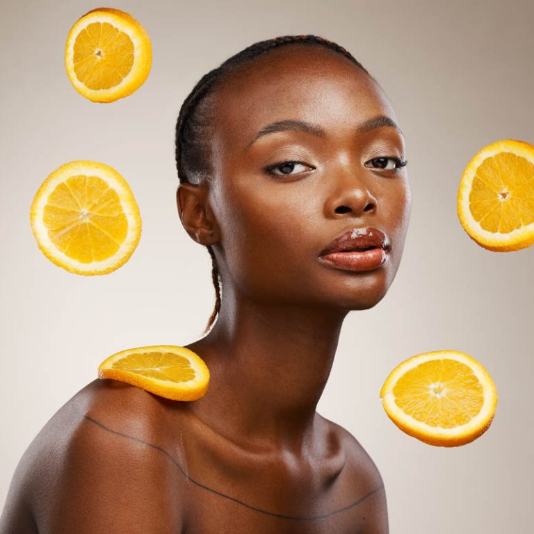 Black woman, skincare or facial treatment with orange, beauty and cosmetics for healthy skin, vitam.