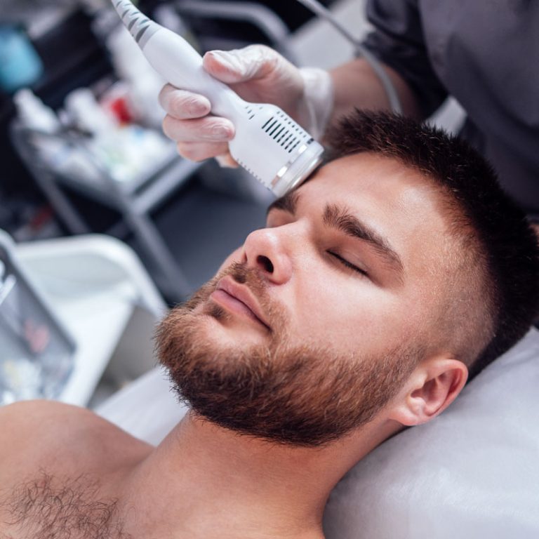 closeup-of-face-of-beautiful-relaxing-man-undergoi-2024-08-06-16-04-03-utc